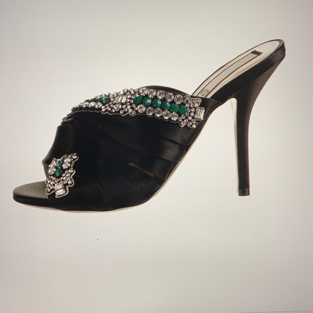 Brand new No. 21 black satin mules.